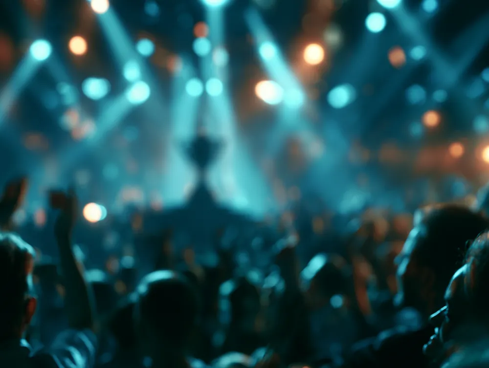 A national competition stage under teal and blue light