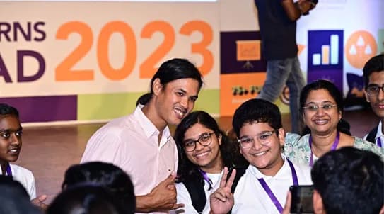 Students celebrating on stage at GSL's Future Unicorns Launchpad